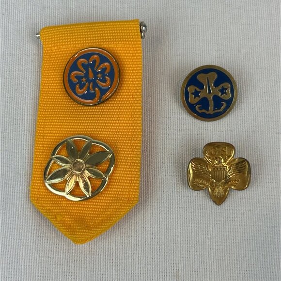 Vintage Girl Scouts Pins Badge Set On Yellow Fabric Ribbon Lot of 5 - Picture 1 of 4